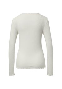 Langärmliges weißes Oberteil mit geripptem Textur und gepunkteten Ärmeldetails. Verfügt über einen runden Halsausschnitt und eine figurbetonte Form mit gewelltem Saum.