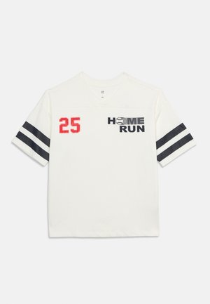 White short-sleeve shirt with black double stripes on sleeves, red number 25 on left chest, and "HOME RUN" with baseball graphic on right chest.