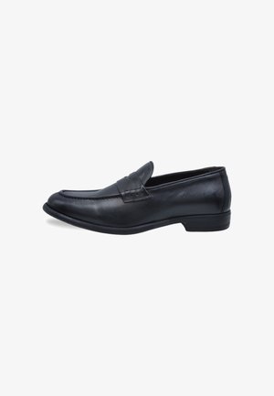Black leather loafers with a rounded toe, featuring a stitched accent across the vamp and a low, textured heel.