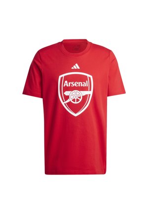 Punane puuvillane T-särk, mille keskel on valge Arsenal'i logo ja üleval adidas'i logo. Ümmargune kaelus, lühikesed varrukad, tavaline lõige.
