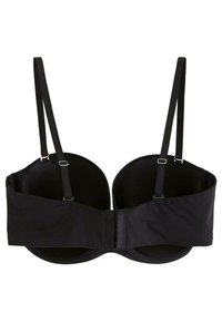 Soutien-gorge noir avec armatures, bretelles réglables, tissu lisse et fermeture à crochets et œillets. Le design présente des bonnets moulés et une finition sans coutures.