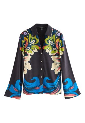 Chemise à manches longues boutonnée avec un col noir et des motifs floraux et ondulés audacieux en vert, bleu, crème, rouge et violet sur un fond sombre.