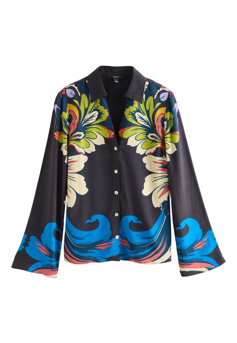 Chemise à manches longues boutonnée avec un col noir et des motifs floraux et ondulés audacieux en vert, bleu, crème, rouge et violet sur un fond sombre.