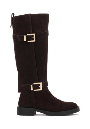Knee-high brown suede boots with a flat sole, two gold-tone buckle accents, and a pull tab at the top for easy wear.