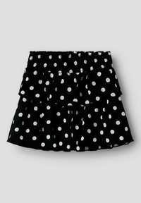 Zwarte, gelaagde rok met witte stippen, voorzien van een elastische tailleband en een gestructureerde stof, die een speels patroon benadrukt.