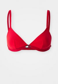 Rød bomulls trekant-bralette med justerbare stropper og sentral lås. Glatt tekstur og minimalistisk design uten ekstra pynt.