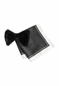 Unselected, black velvet polka dot