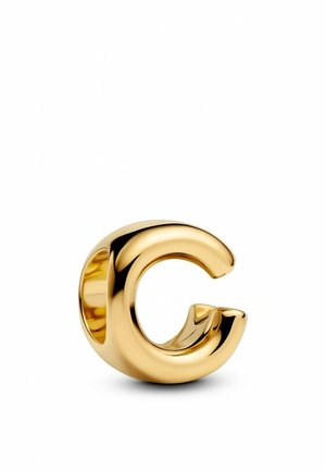 Goldener Buchstabe "G" Ring mit einem abgerundeten, skulpturalen Design. Glatte Textur mit hochglänzender Oberfläche, die ein hohles Zentrum präsentiert.