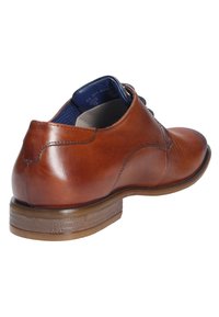 Braune Leder-Dressschuhe mit glatter Oberfläche, runder Zehenform und niedrigem Absatz. Verfügt über ein dezentes geripptes Muster an der Seite. Schnürdesign.