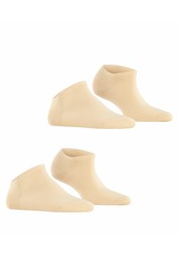 Beige Knöchelsocken mit einer glatten Textur, niedrigem Schnitt und verstärktem Zehenbereich. Vier Paare sind in zwei Reihen gestapelt zu sehen.