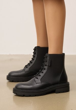 Botines con plataforma - black