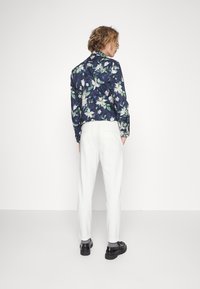 Lindbergh SUPERFLEX CROPPED  - Chinos - off white mix