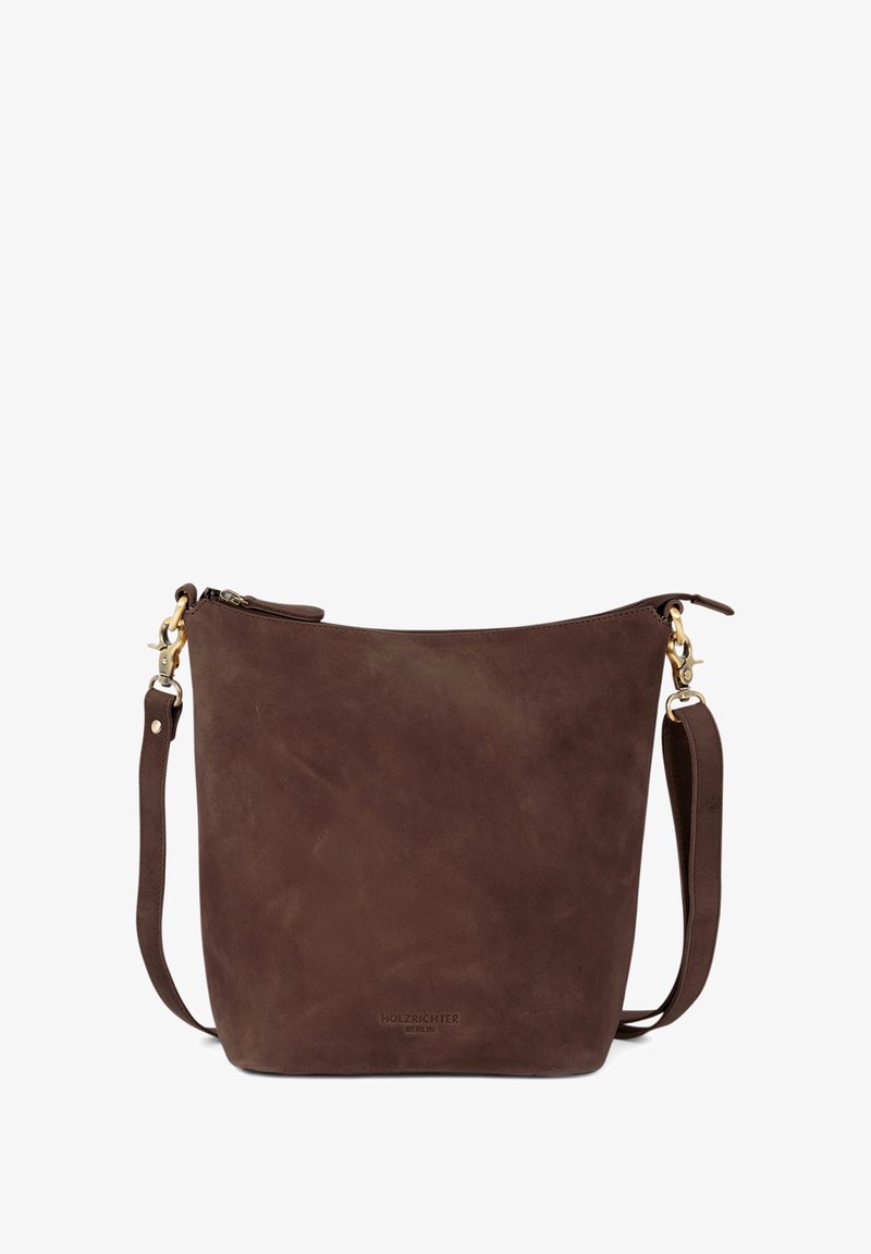 Braune Lederhandtasche mit glatter Textur, Reißverschluss und verstellbarem Schultergurt. Verfügt über dezentes Branding am Boden.