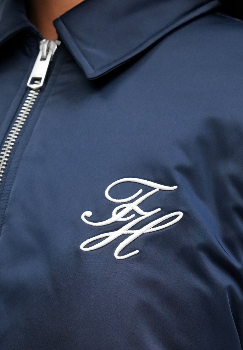 Tommy Hilfiger WATER REPELLENT SATIN RELAXED PADDED JACKET - Mezisezónní bunda - dark night navy