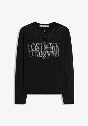 Black ribbed long-sleeve henley shirt with three buttons and white distorted text "LOST WITHIN" printed on the chest.