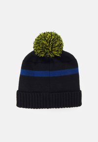 Berretto di maglia nera con risvolto a costine, caratterizzato da una striscia blu e un pompon verde brillante sulla sommità. Tessuto morbido con vestibilità elastica.