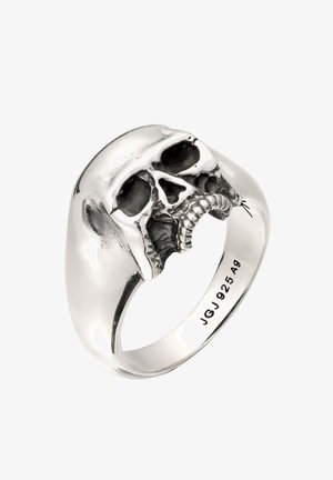 Bague en argent ornée d'un motif détaillé de crâne sur le dessus avec « JGJ 925 Ag » gravé à l’intérieur de l’anneau.