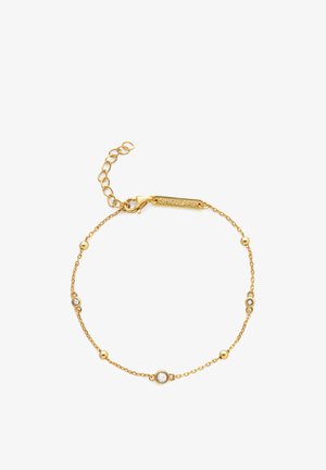 Bracciale a catena d'oro con maglie decorative, caratterizzato da dettagli rotondi e quadrati, e chiusura a moschettone. Marchio inciso sulla chiusura.