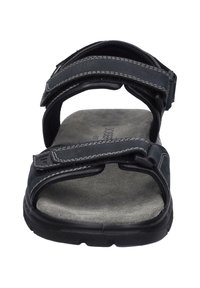 Infradito neri con cinturini in velcro, soletta in suede e suola in gomma. Dettagli cuciti sui cinturini; design aperto per una buona traspirazione.