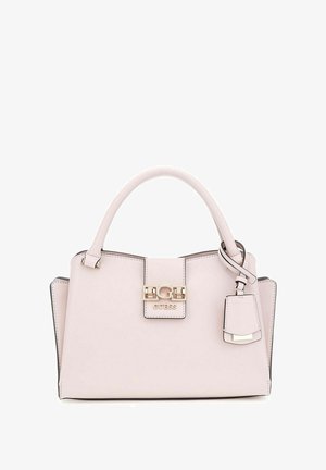 Sac à main rose clair en matériau lisse, doté d'un fermoir doré, d'un logo et d'une étiquette d'accent amovible. Forme structurée avec des poignées.