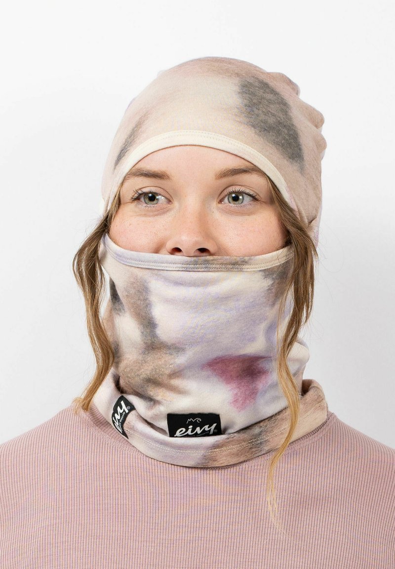 Multifunctionele hoofdbedekking gemaakt van zachte, rekbare stof, met een verfijnd abstract patroon in zachte pastelkleuren. Inclusief merklabel.