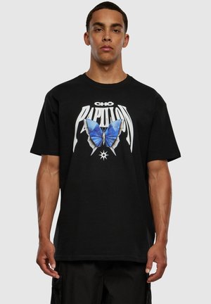 Black cotton t-shirt featuring a blue butterfly graphic and bold white lettering. Crew neck, short sleeves, relaxed fit.