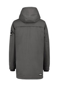 Grey waterproof jacket with a hood, featuring a straight cut, elastic cuffs, and logo accents on the sleeves and bottom hem.