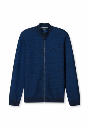 Marineblaue Zip-Jacke mit strukturiertem Muster, Stehkragen und gerippten Bündchen, die eine glatte Oberfläche und solide Verarbeitung präsentiert.