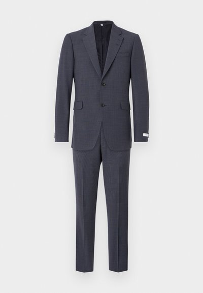 Laivansinis paltas su notch apykakle, dvejomis sagomis ir dviem priekinių kišenių. Tekstūruota medžiaga su subtiliais raštais. Prisiūtos kelnes.