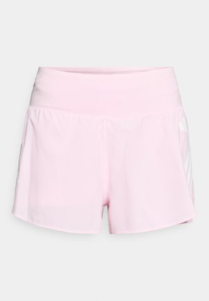 Pink athletic shorts with a wide waistband, smooth texture, and contrasting white side accents. Features a loose fit with rounded hems.