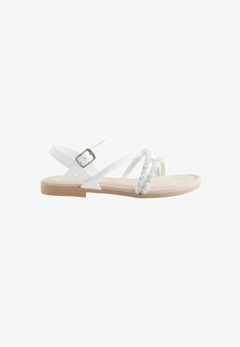 Weiße flache Sandalen mit verstellbarem Knöchelriemen, strukturiertem Wildleder-Innenaufbau und dekorativen, mit Perlen versehenen Riemen. Leichtgewichtig mit minimalistischem Design.