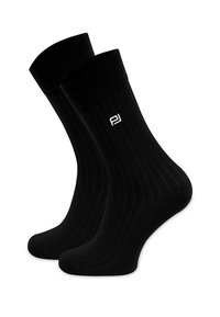 Czarne bawełniane skarpetki o fakturze ribbed, sięgające za kolano, z małym białym haftowanym logo po boku.