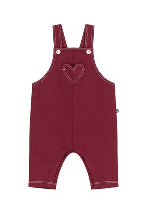 Bordeauxfarbene Baumwoll-Latzhose mit verstellbaren Trägern, herzförmigem Taschen-Detail und weißer Naht. Hat offene Beine am unteren Ende.