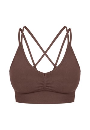 Soutien-gorge de sport marron avec un design triangulaire, doté de bretelles croisées, d'un devant froncé et d'une large bande côtelée en bas.