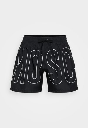 Calções de banho pretos com grandes letras brancas a dizer "MOSC", feitos de material leve, com uma cintura elástica e cordão ajustável.