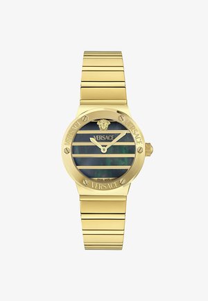 Zelta metāla pulkstenis ar apaļu seju, ar melnu un zaļu svītrojumu ciparnīcu un Versace logotipu. Izaicinājuma zelta siksniņa un raksturīgas aparatūras akcenti.