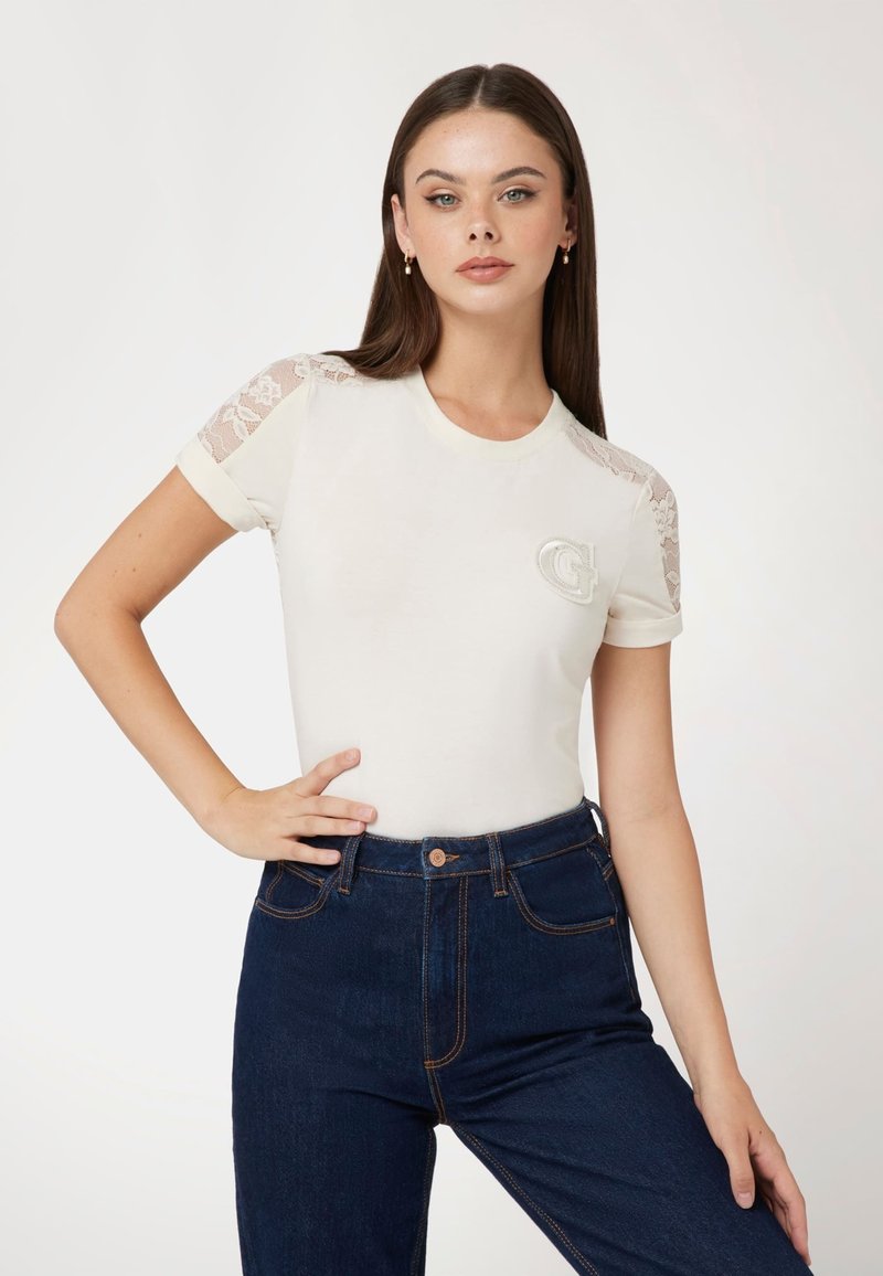 Guess T-shirt con stampa - creme