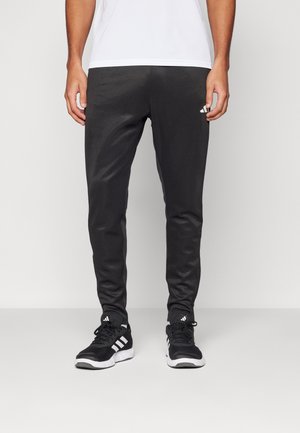 HOUSE OF TIRO - Pantalones deportivos - black/white