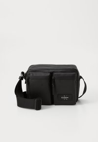 TECH UTILITY RUBBER - Cross body bag - black