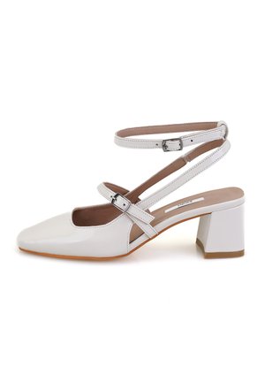 Klassieke pumps - beige