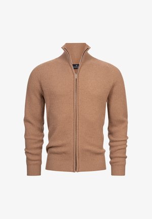 Beżowy sweter zapinany na zamek z wysokim kołnierzem, długimi rękawami i dopasowanymi mankietami. Wykonany z miękkiego, teksturowanego materiału.