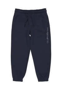Marineblå sweatpants i blødt stof, med elastisk talje med snøring og elastiske manchetter. Bemærkelsesværdig Quiksilver-logo langs siden.