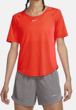 Nike Performance T-shirt imprimé - coral