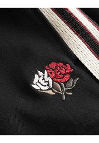 Les Deux STERLING TRACK PANTS - Calças de fato de treino - black/ivory