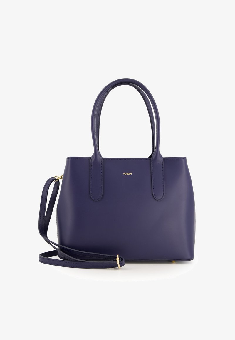 Navy leather handbag with dual top handles and a detachable shoulder strap. Features gold logo detailing. Smooth texture and structured shape.