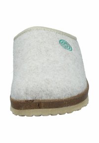 White felt slipper with a beige sole, featuring a green spiral design on the front and a beige trim along the opening.