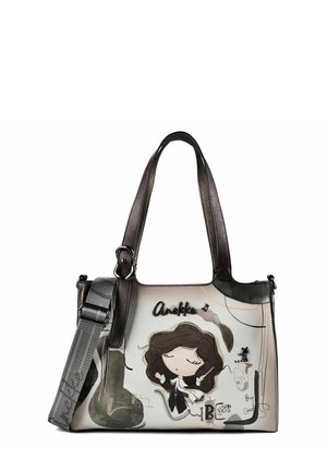 Borsa in pelle con manici scuri, con una ragazza dei cartoni animati con occhi chiusi, note musicali e disegni artistici in bianco e nero.
