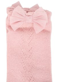 Legwarmers rosa lavorati a maglia con un motivo testurizzato e un grande fiocco in cima. Tessuto morbido con un aspetto accogliente.