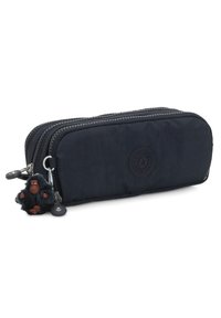 Trousse à crayons zippée bleu marine en nylon, avec un logo rond et un porte-clé singe en peluche. Deux compartiments avec des détails de fermeture éclair gris.
