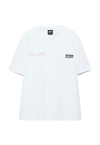 T-shirt blanc à manches courtes avec le texte "STWD Community" et deux petits logos graphiques abstraits sur la partie supérieure avant de la poitrine.